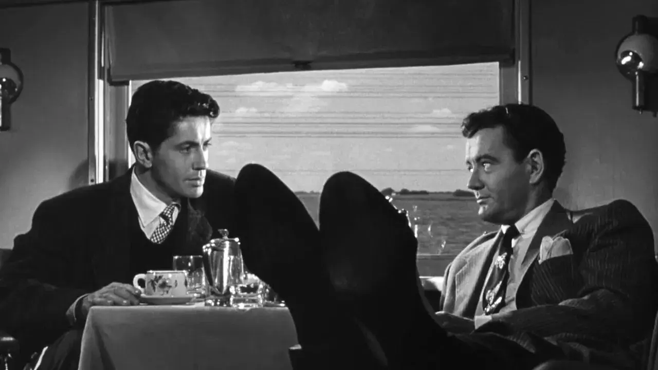 Extraños en un tren fondo