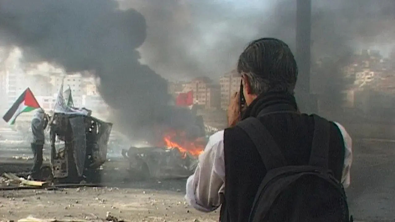 Fotógrafo de guerra fondo