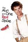 El hombre con un zapato rojo